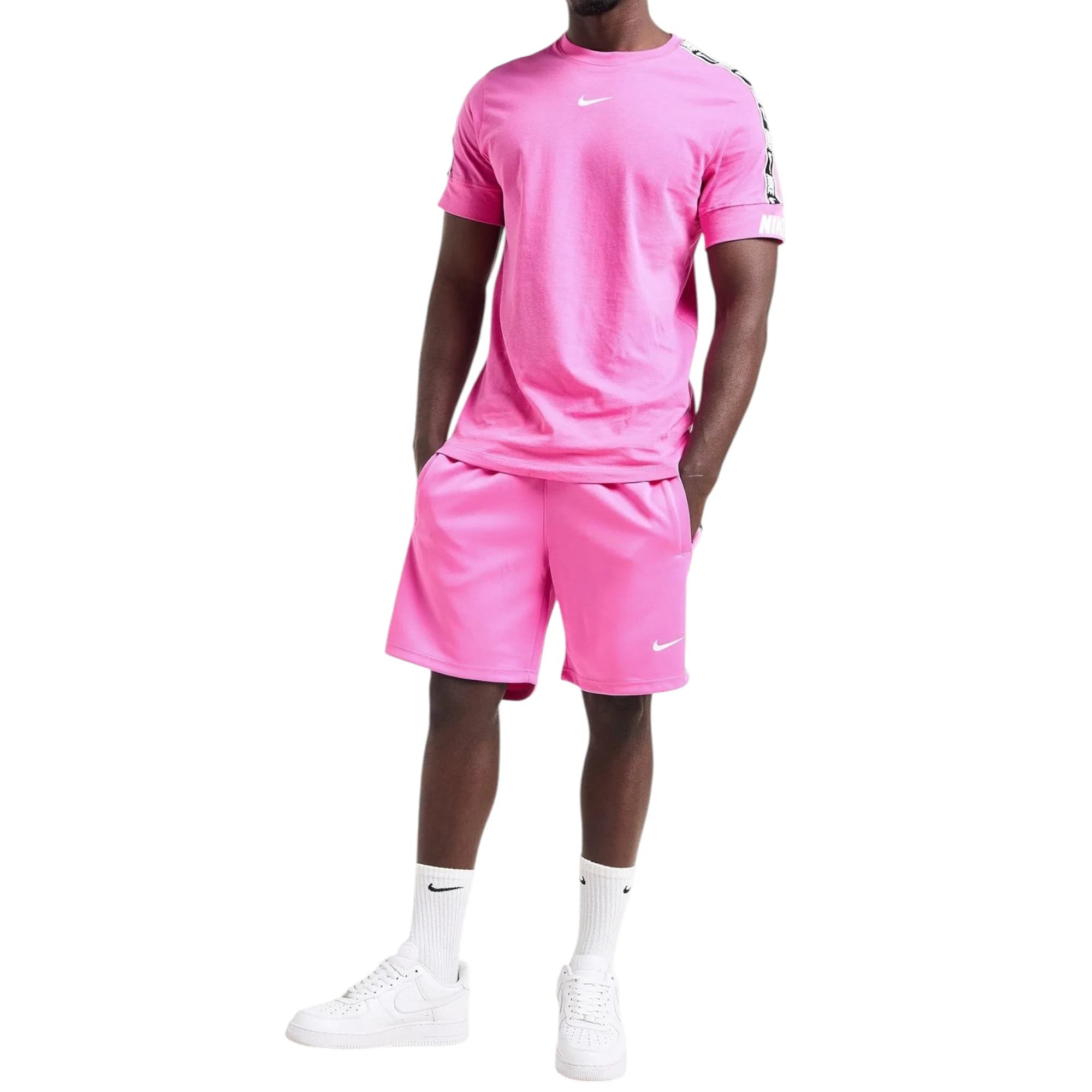 Nike men's pink tracksuit set with cotton t-shirt and fleece shorts, front view
