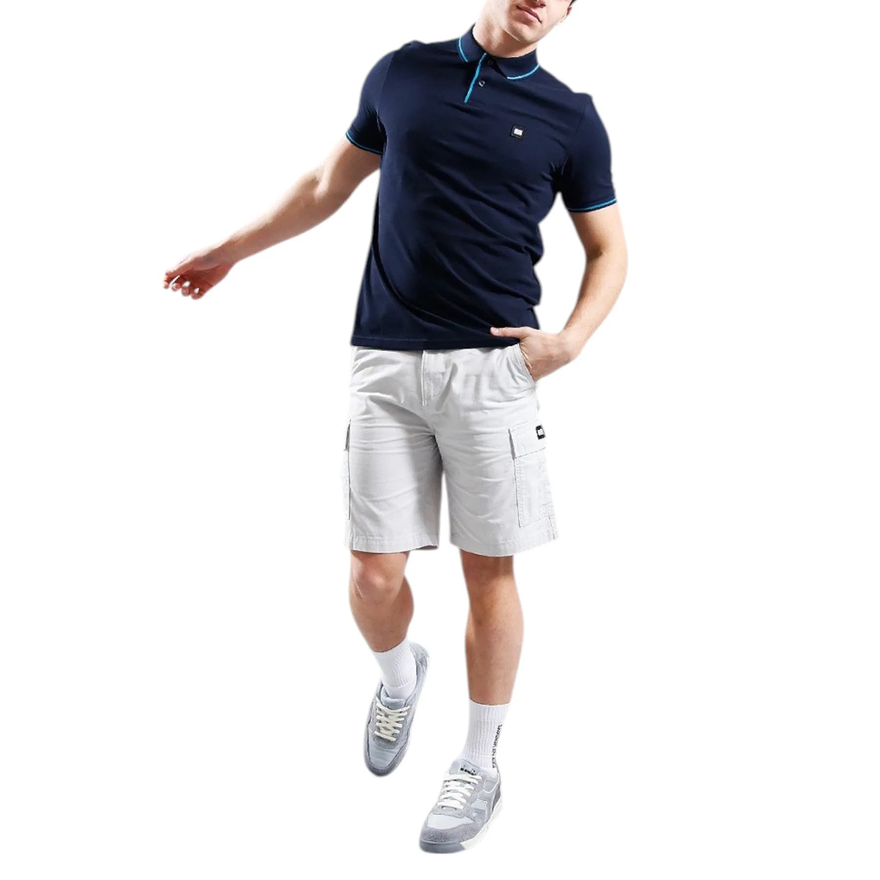 Weekend Offender navy cotton polo shirt front view with WO badge