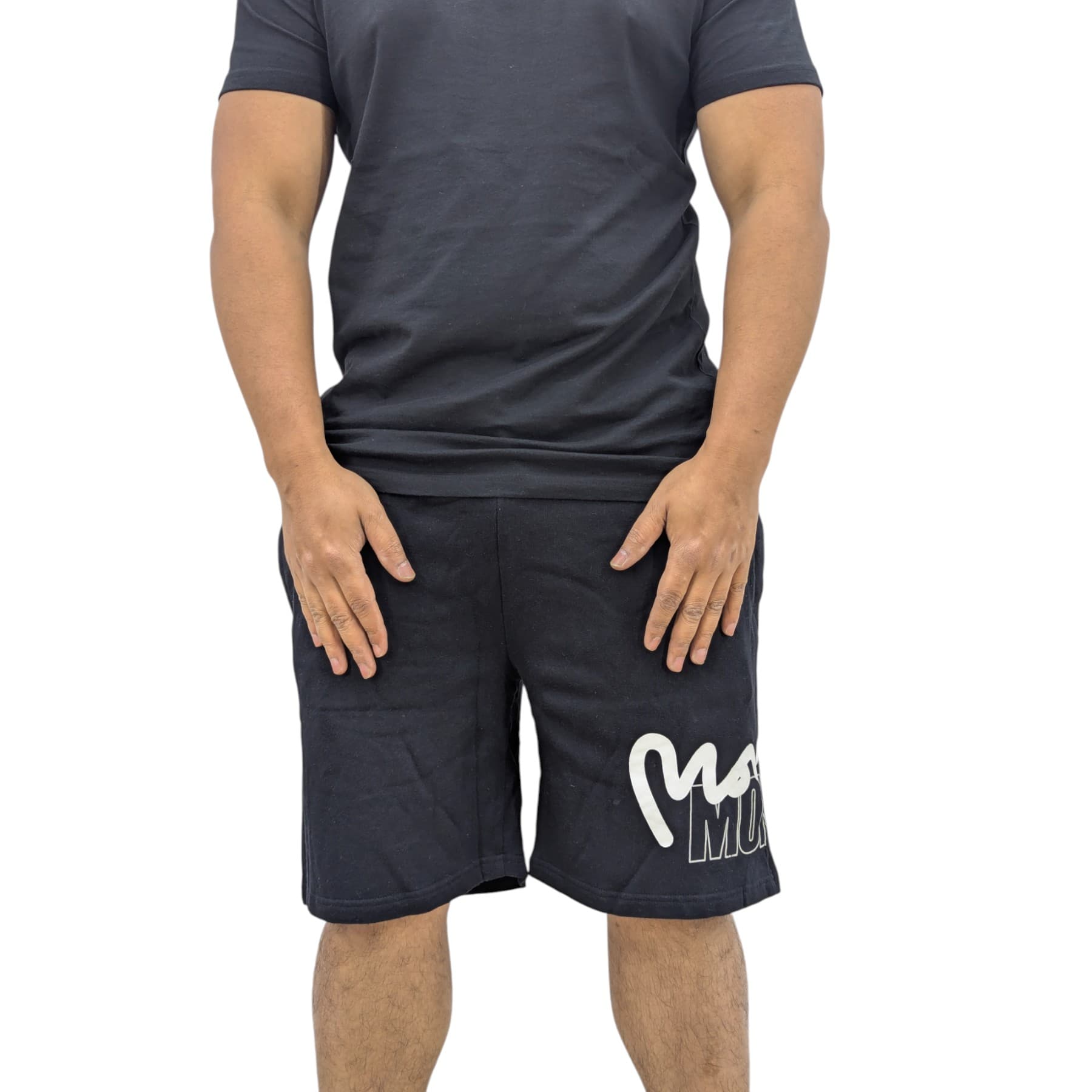 Money Clothing men's black shorts with logo detail, front view