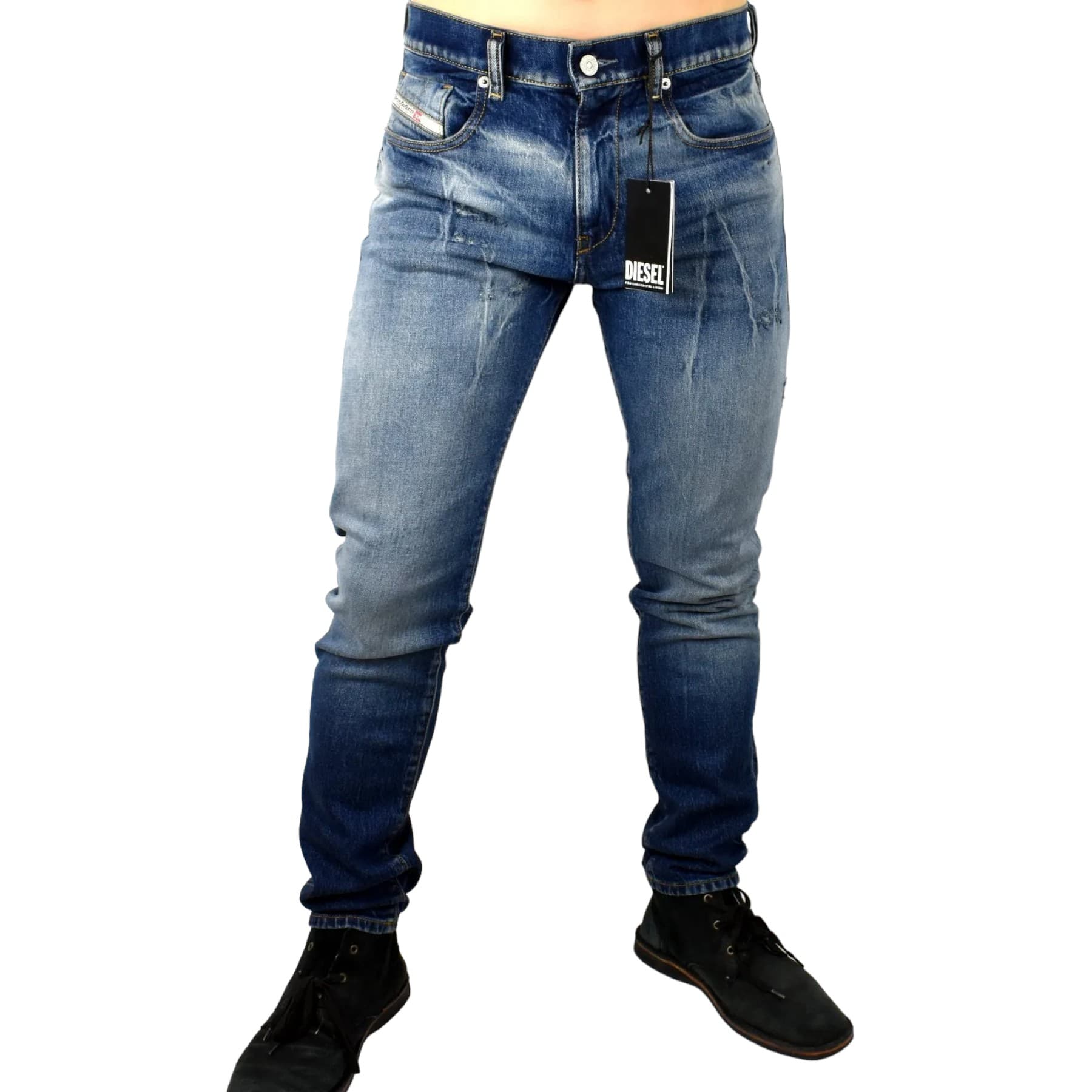 Diesel D-STRUKT men's slim-fit denim jeans in medium blue with distressed wash, front view